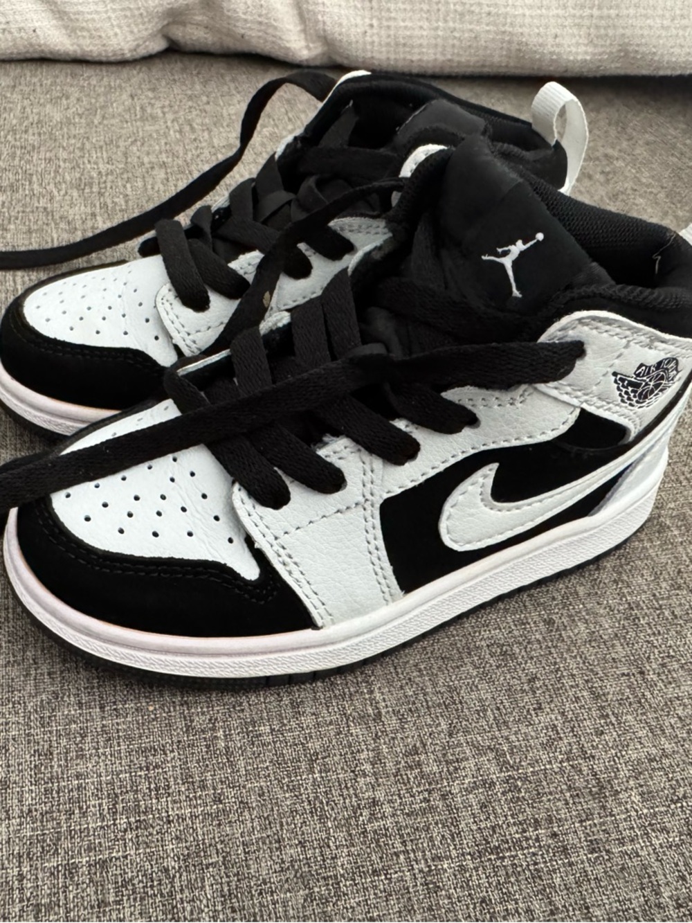Jordan Kids Black and White High-Top Sneakers